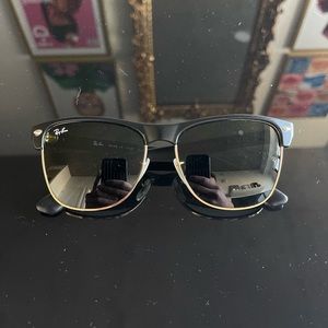 Women’s RayBan sunglasses in Black and Gold
